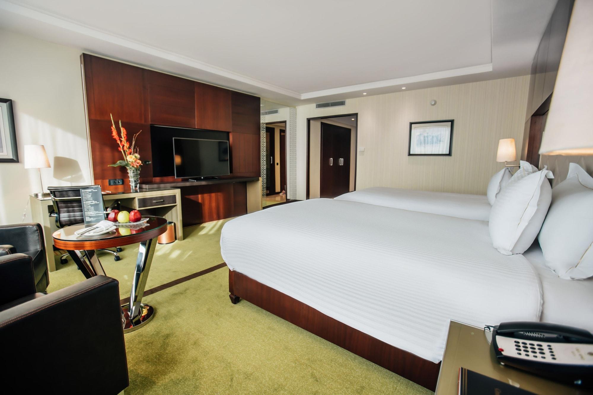 Grand Mogador City Center Casablanca Exterior foto A room at the hotel