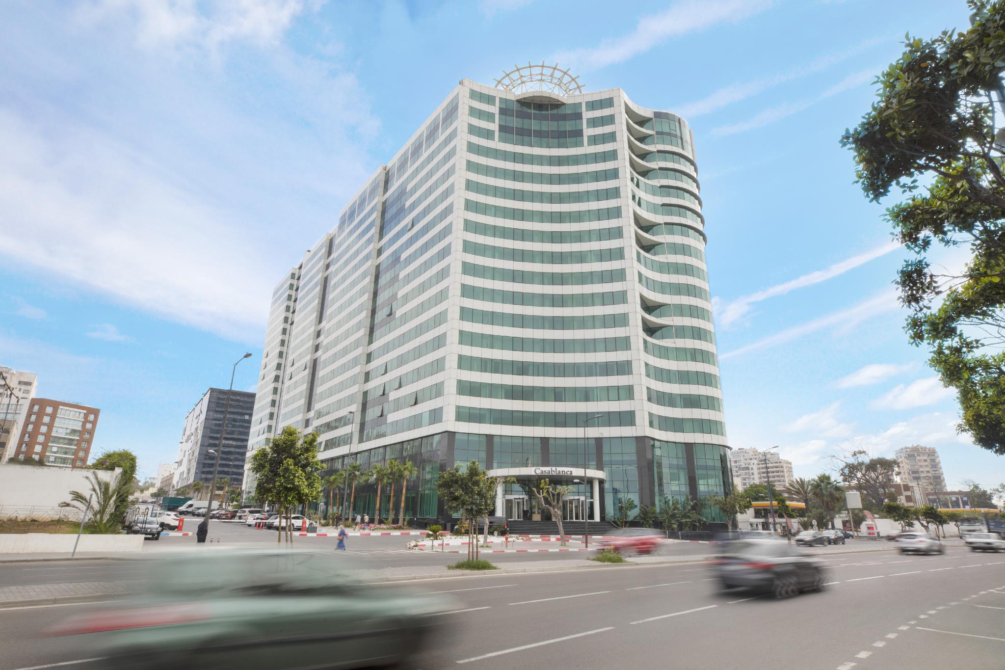 Grand Mogador City Center Casablanca Exterior foto The headquarters of the National Bank of Egypt in Tahrir Square, Cairo